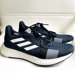 Adidas boys running shoes, size 5, never worn.